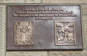 Image of plaque to commemorate the first printed book in Scotland